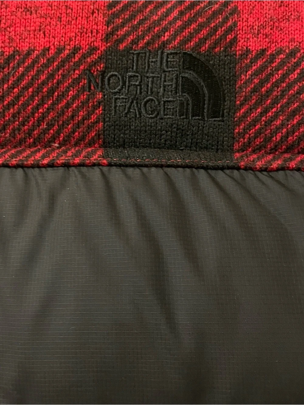 The North Face Nuptse 700 puffer vest Size M. buffalo plaid design on the yoke.